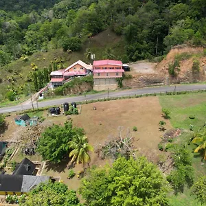 https://las-cuevas-beach-lodge.comcaribbean.com